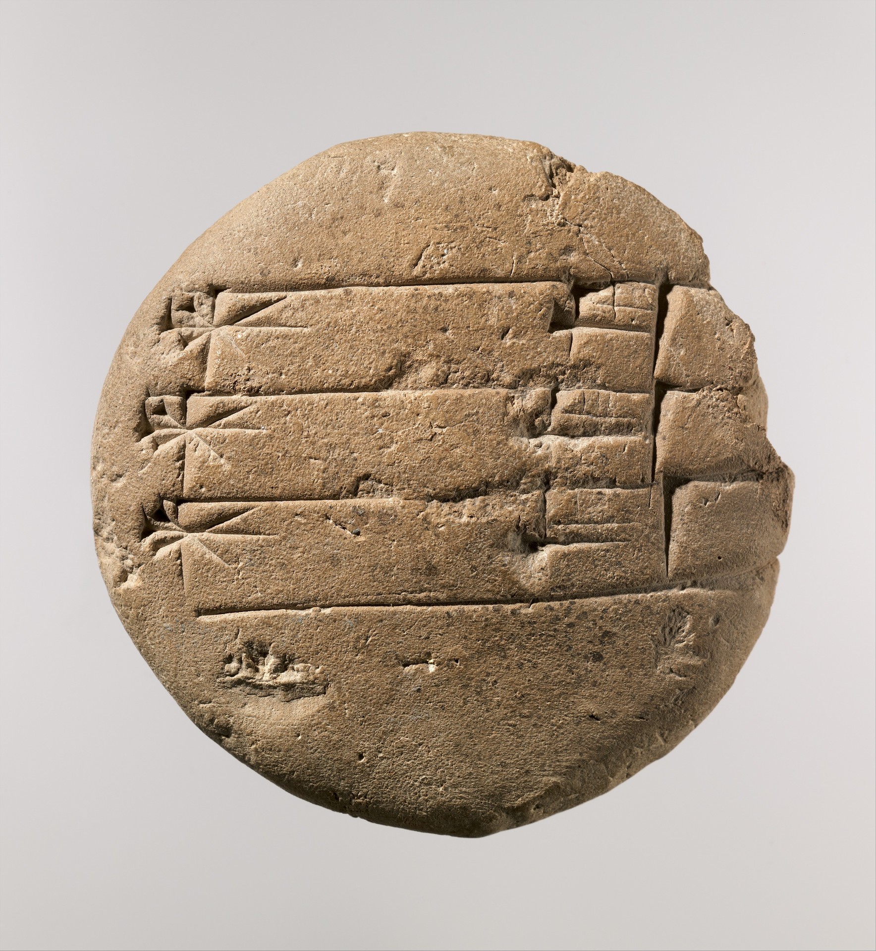 Round clay exercise tablet bearing repeated rows of wedge-shaped cuneiform signs.