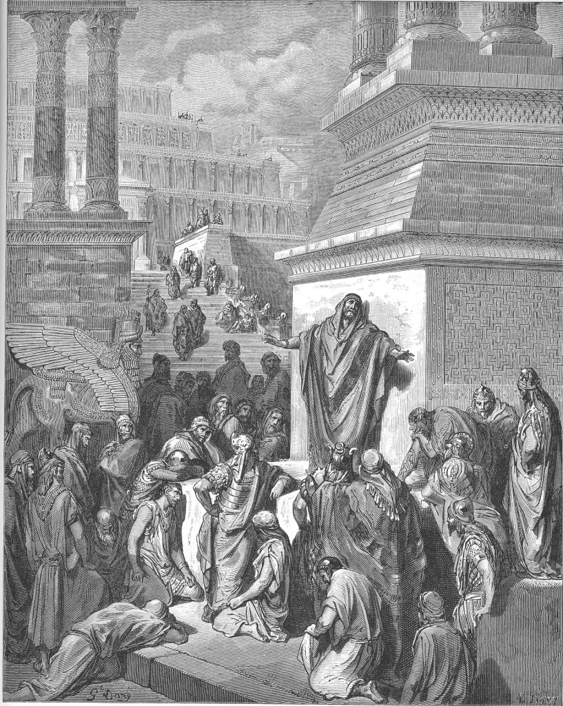 An engraving of a robed man standing on a step with his arms spread, speaking to a crowd that kneels and bows before him among massive Assyrian buildings and a winged bull.